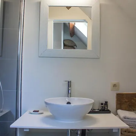 Koetshuis Bed and breakfast Brujas